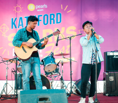 Students performing live music on stage as part of Kathford Sparks festival festivities
