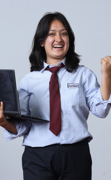 Enthusiastic student holding a laptop