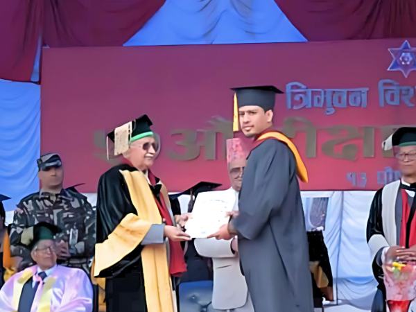 Kathford student Ashish Thapa receiving Shivraj Pant Memorial Award for academic excellence