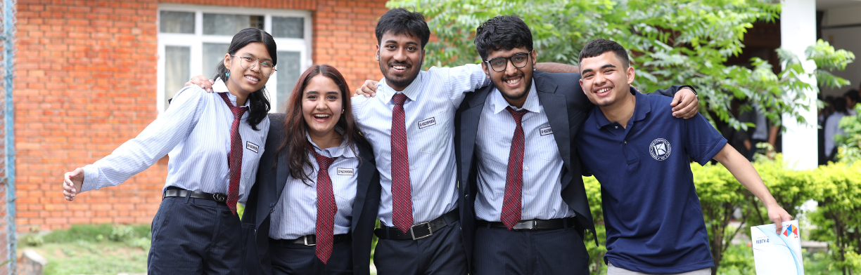 Students sharing a moment of friendship at Kathford College