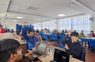 Participants learning Flutter fundamentals during two-day workshop at Kathford College
