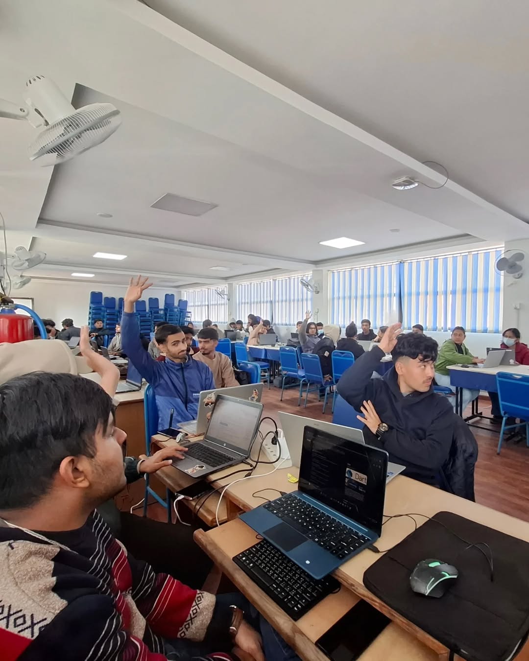 Participants learning Flutter fundamentals during two-day workshop at Kathford College