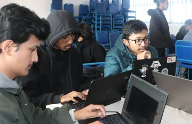 Participants learning Git and GitHub fundamentals during workshop at Kathford College