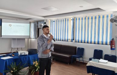Student Holding Mic
