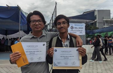 Nischal Shakya and Priyajan Swongamikha receiving awards for winning Codewars Competition