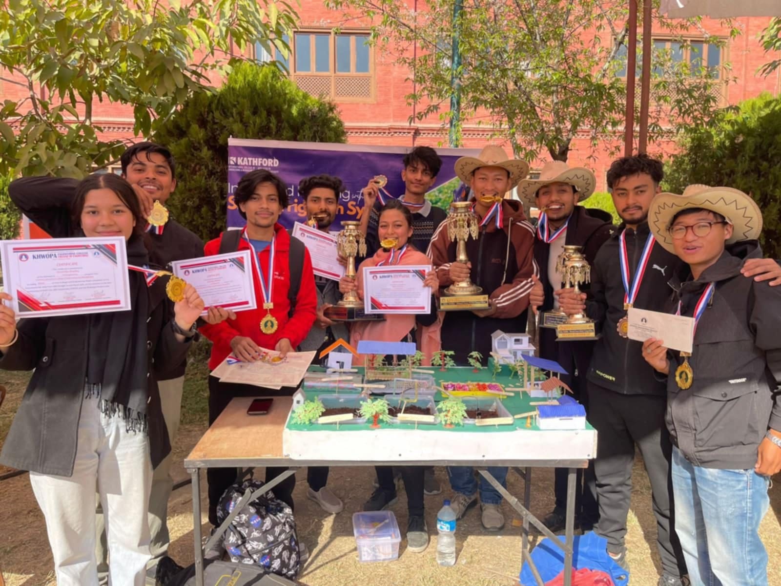 Winners of 3D Modeling Competition at Khowpa College with certificate, medal and awards
