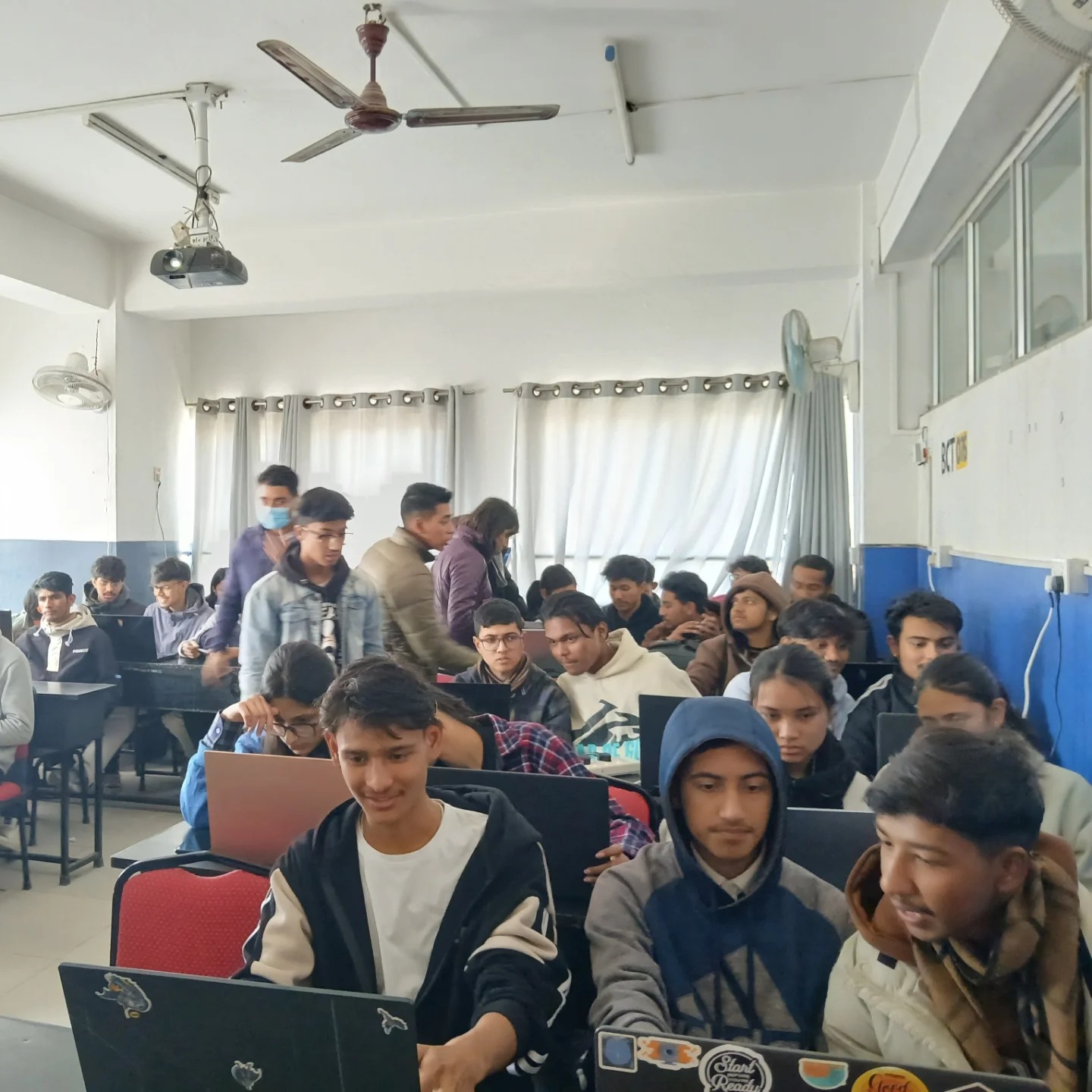 Participants attending Git/GitHub and Advanced Python workshop at Kathford College