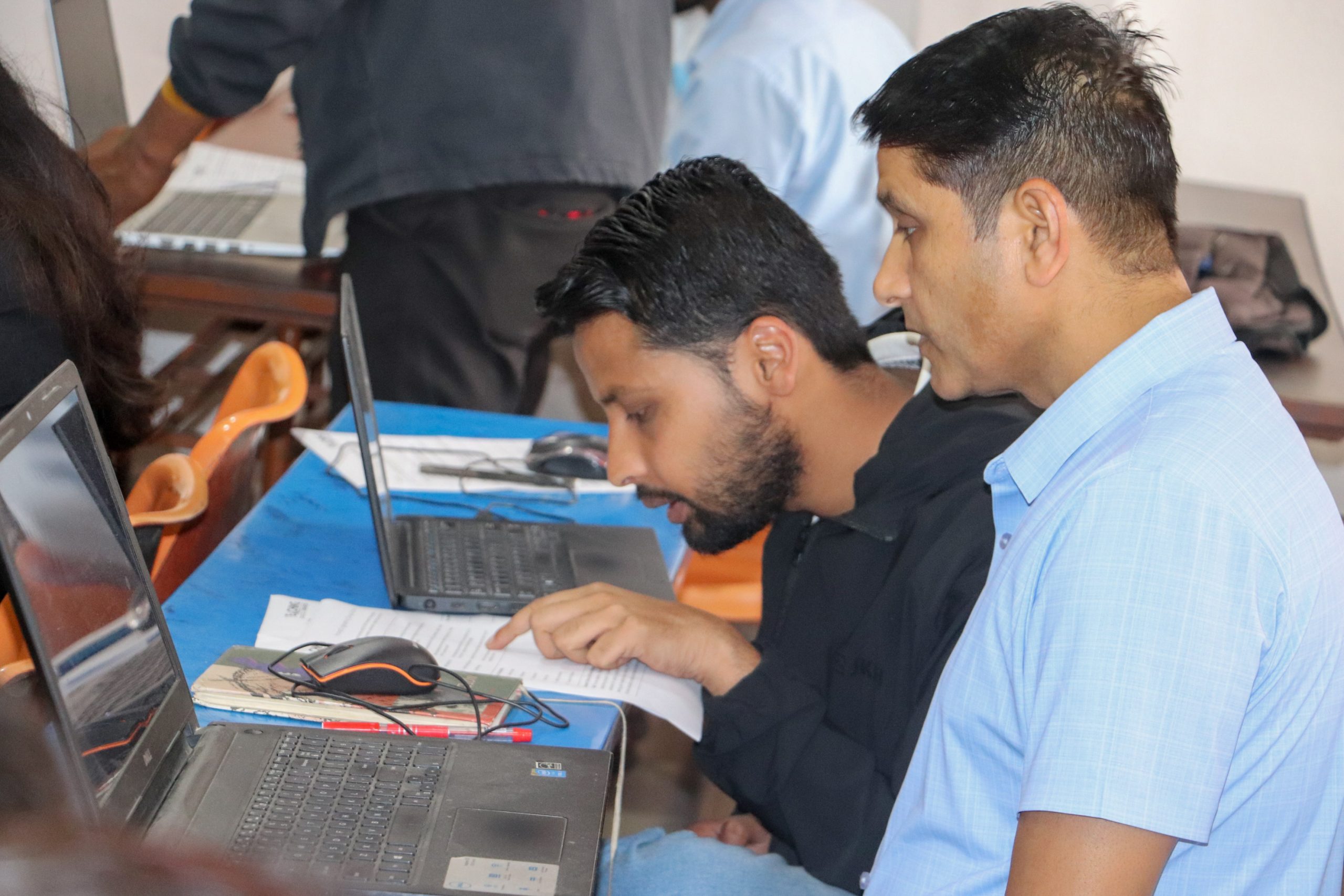 Teacher and student discussing a topic