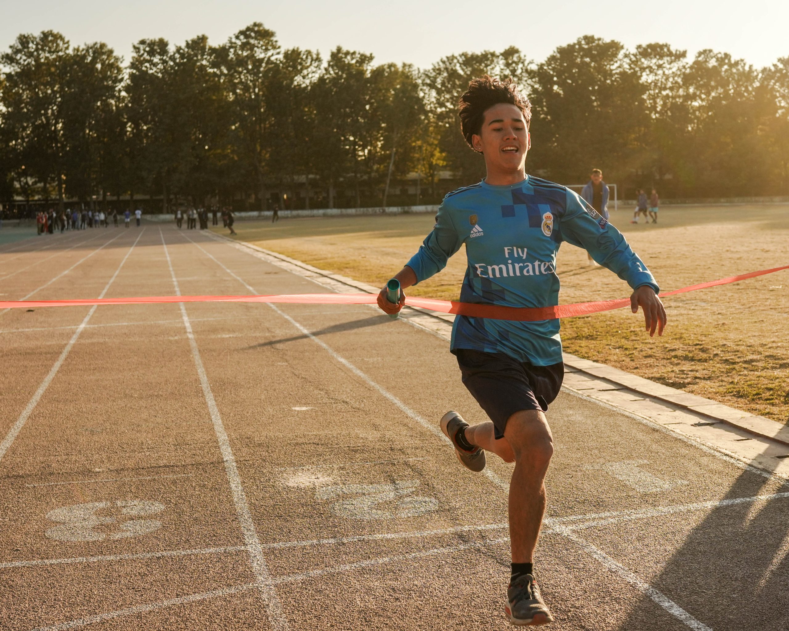 Rellay Race Runner Crossing Final Line