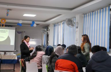Students attending a career guidance session answering the question is management better than science for future leaders