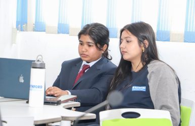 students learning coding for IT career in Nepal using laptop in classroom