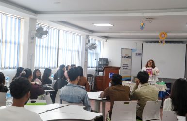 Counsellor addressing students during exam stress management session