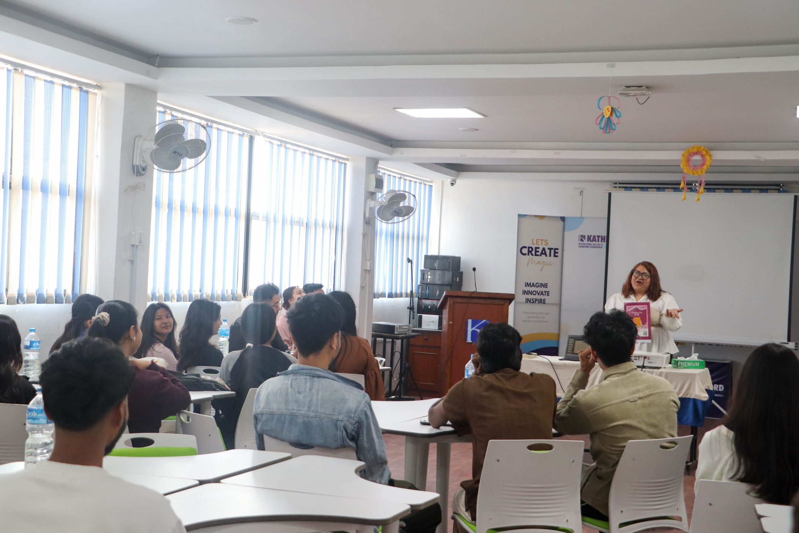 Counsellor addressing students during exam stress management session
